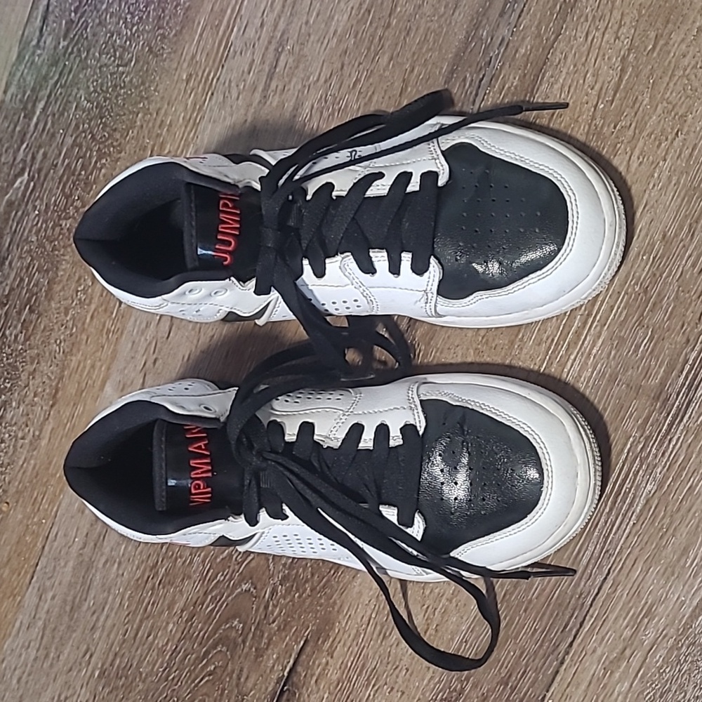 Black and white Nike kids Jordan's.